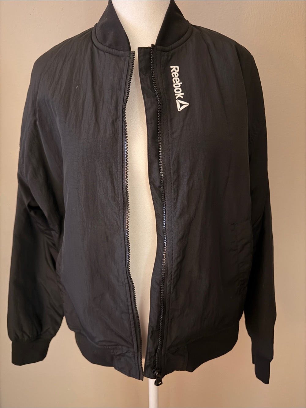 Women’s Reebok Black Lightweight Bomber Jacket with White Logo
